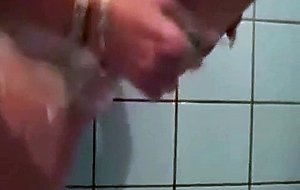 Wet soapy hairy college pussy gets shaved in the shower