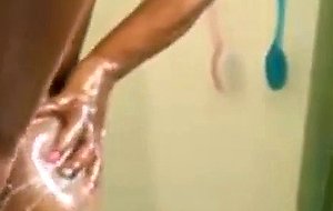 Sexy ebony shakes her booty in the shower 