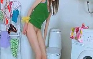 Lovely teen pissing and fingering pussy hole