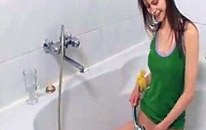 Skinny busty girl showering pussy
