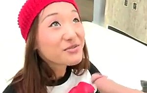 Pretty asian teen on her knees sucking enormous cock