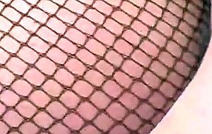 Redhead tranny in fishnet gets ass stretched