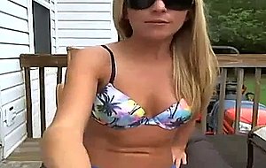 Sexy blonde teasing outdoors
