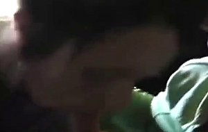 Two girls sucking cock