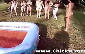 Naked amateurs in outdoor water fight