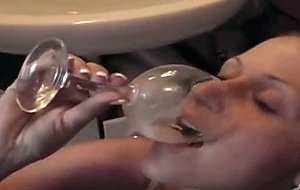 Whore drinks load of white honey nut from wine glass