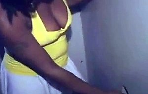 Black girl takes cumshot on her tits at glory hole