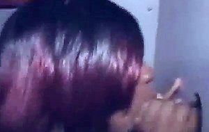 Black girl takes cumshot on her tits at glory hole