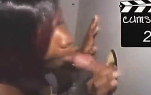 Black girl takes cumshot on her tits at glory hole