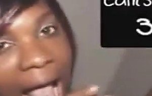 Black girl takes cumshot on her tits at glory hole