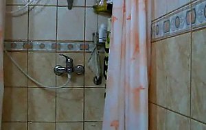 Amateur crossdresser in a shower