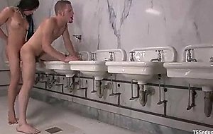 Guy takes dick from tranny in lavatory