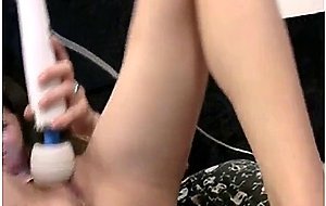 Cam Slut Squirts Cum Using Hitatchi With a Tampon in