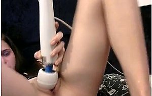 Cam Slut Squirts Cum Using Hitatchi With a Tampon in