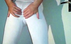 Amateur crossdresser in white leggings