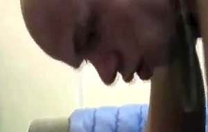 Coating his face with cum