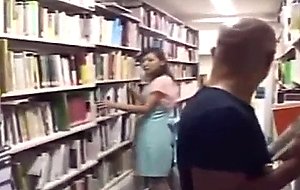 Young jap girl sucking in library