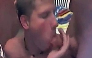 Teen guy gets two cocks to suck on