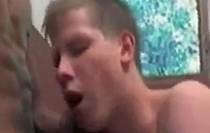 Teen guy gets two cocks to suck on