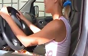 Blonde girlfriend masturbating in a car
