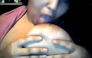 Arab slut sucks her tits