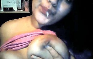 Arab slut sucks her tits