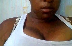 Ebony shows big tits on webcam