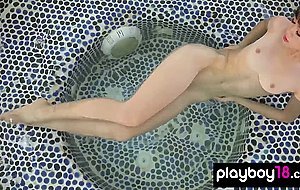 Petite small titted asian teen Sowan stripping and relaxing in the pool