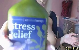 Hot Babe oiling up her big tits on webcam