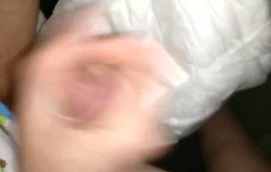 Twink cumming his wet diaper