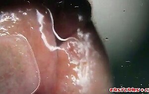 macro close up cumming on glass