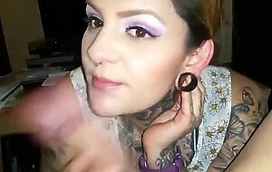 tattooed girl sucks cock