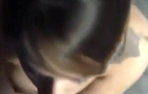 Busty babe on her knees sucking dick and eating cum