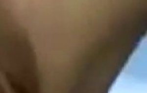 Busty blonde sitting on a desk squirts