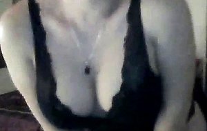 Mature blonde is showing her tits and cock on cam