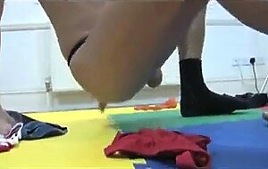 Two older men in thongs