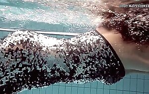 Brunette teen shows her nude body to you