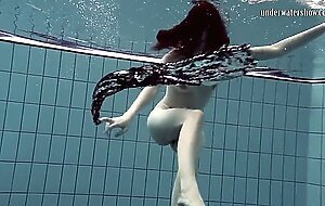 Brunette teen shows her nude body to you