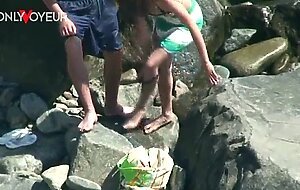 Beach voyeur. horny teen babe rides her boyfriend on the beach