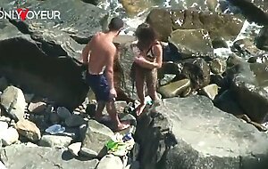 Beach voyeur. horny teen babe rides her boyfriend on the beach