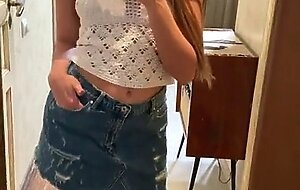 cute blonde stripping in front of the mirror