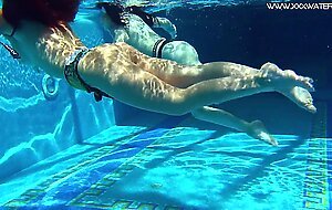Sexy babes with big tits swim underwater in the pool