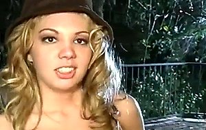Busty blonde strips and pisses