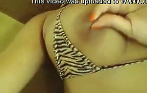 Teen strips out her sexy tiger bikini