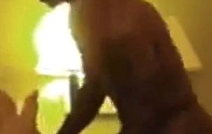 She takes her black personal trainer to her hotel