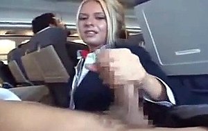 sublime stewardess gives a blowjob in plane