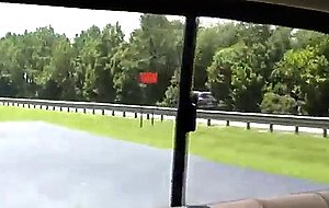 Busty milf driving topless on the highway