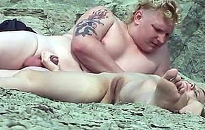 She gets her pussy fingered by a fat boy