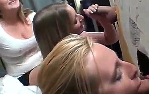 College hotties gobbling dicks through holes at dorm party