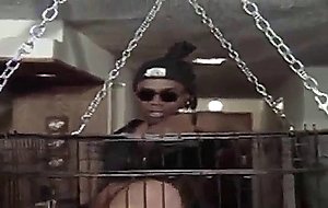 Caged brunette gangbanged